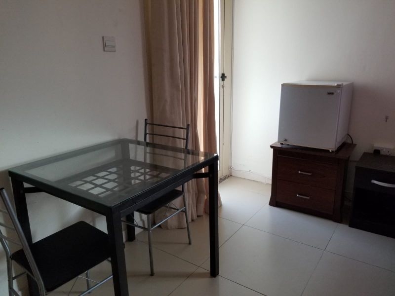 Furnished room with attached bath and big balcony behind of NMC hospital for Executiv single person